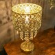 image 1 of ValueLights Enna Gold Moroccan Style Bedside Table Lamp with Acrylic Jewel Droplet Drum Lampshade - Bulb Included