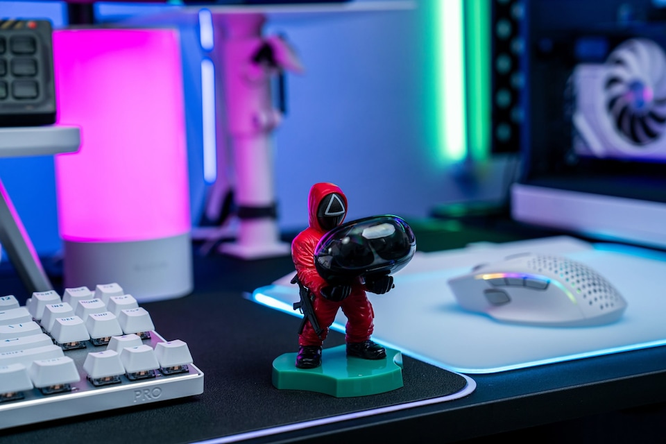 image 1 of Cable Guys Holdems Squid Game Triangle Guard Mini Phone Stand and Device Holder