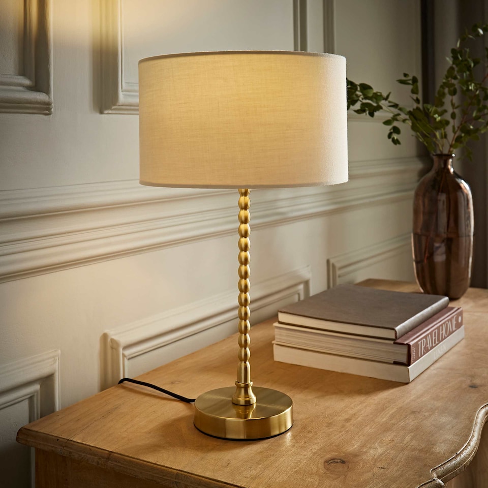 image 1 of ValueLights Maeve Cream Shade Brushed Gold Bobbin Bobble Table Lamp and Bulb