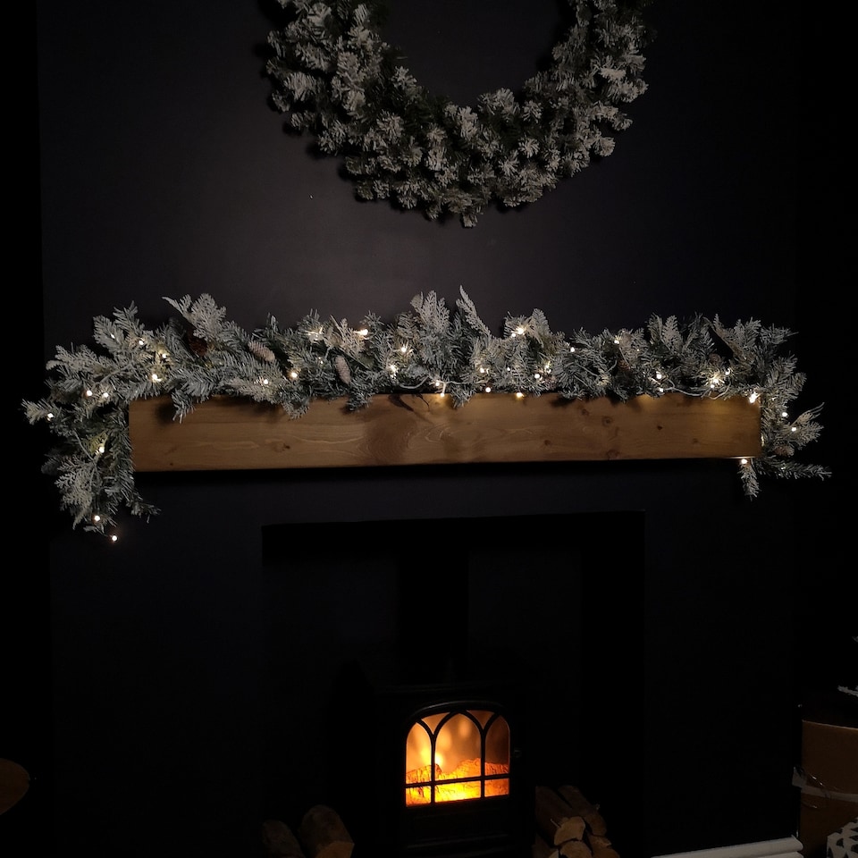 image 1 of 1.8m Snowy Christmas Garland with Pinecones 96 Tips and 50 Warm White LED Lights
