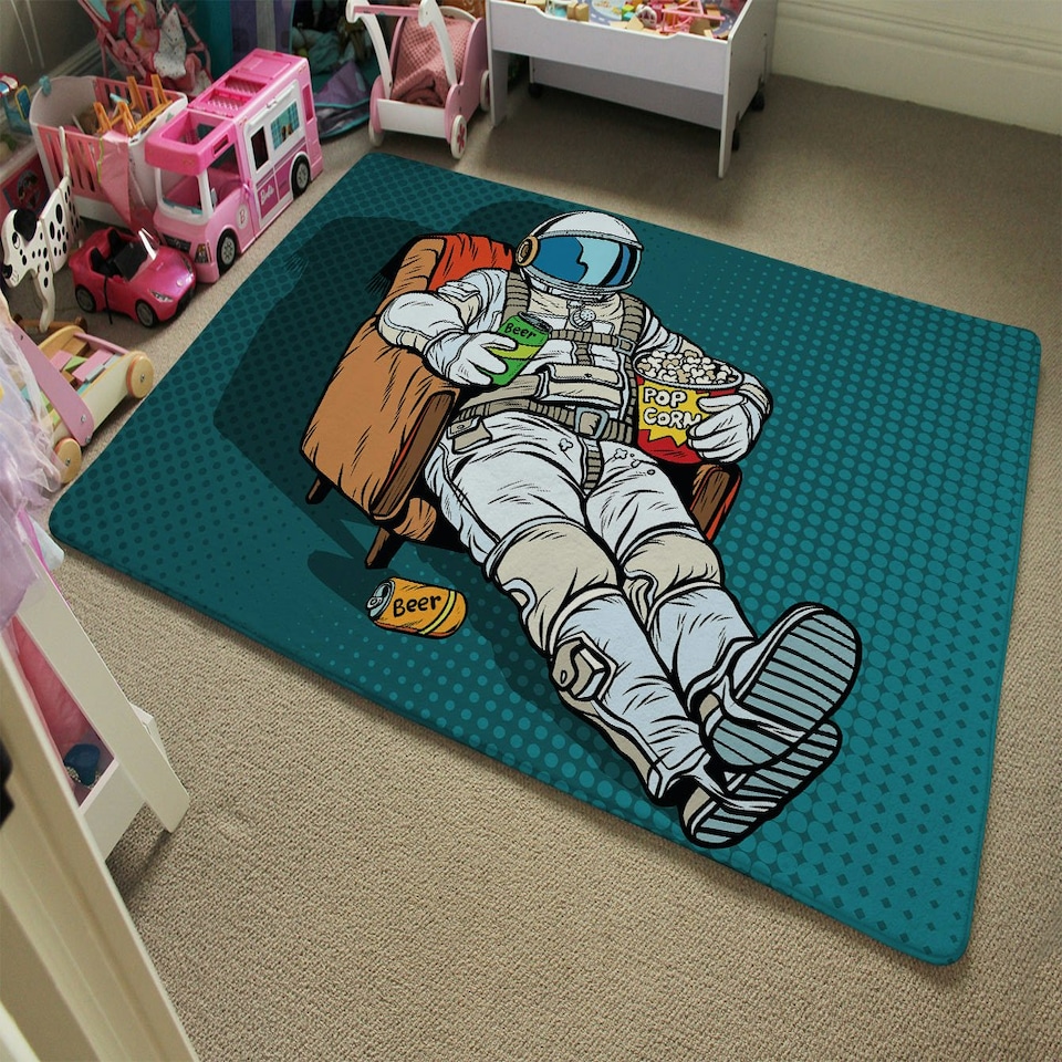 image 1 of Astronaut the audience with beer and popcorn sitting in a chair. loneliness in space. Pop art retro (Rug) Cream | S