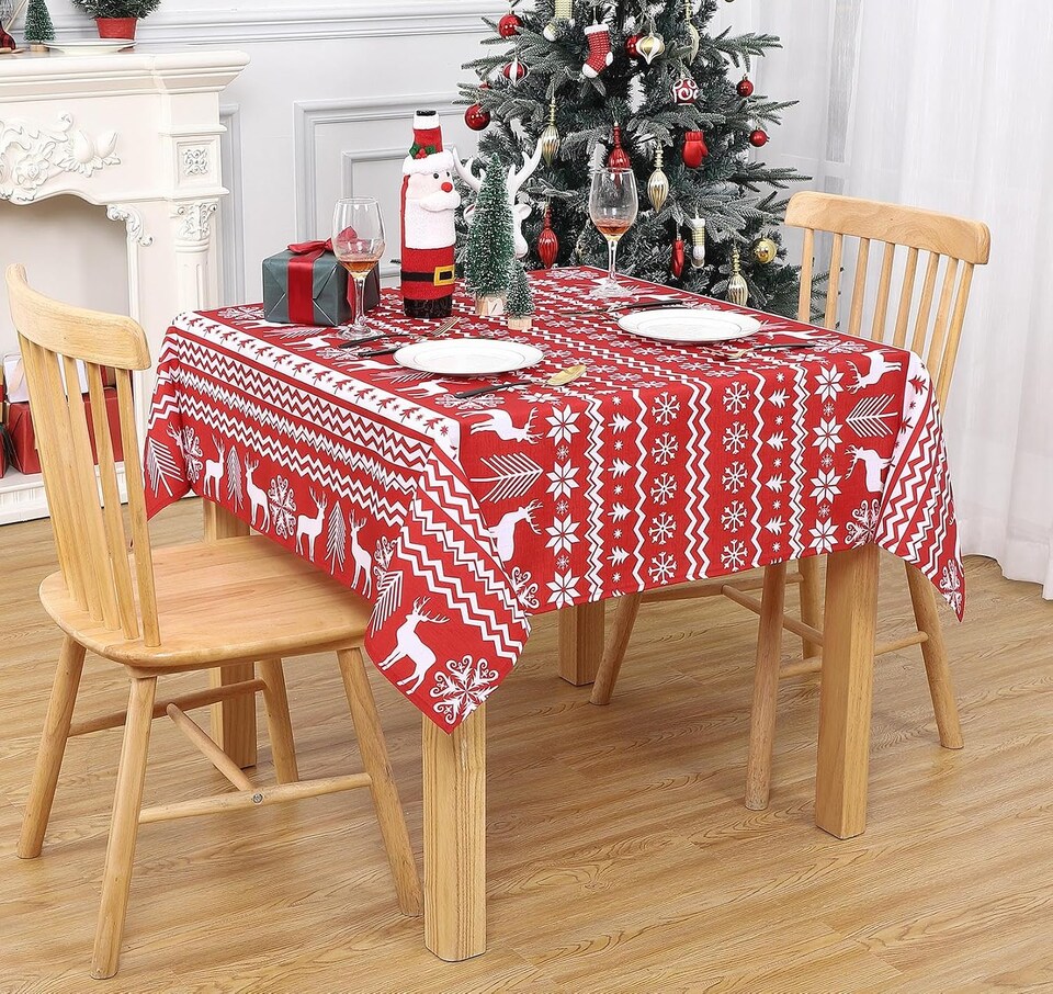 image 1 of London Boutique Christmas Tablecloth, Water‑Resistant, Boho Snowflake and Reindeer Print, Red, 52 x 52 in