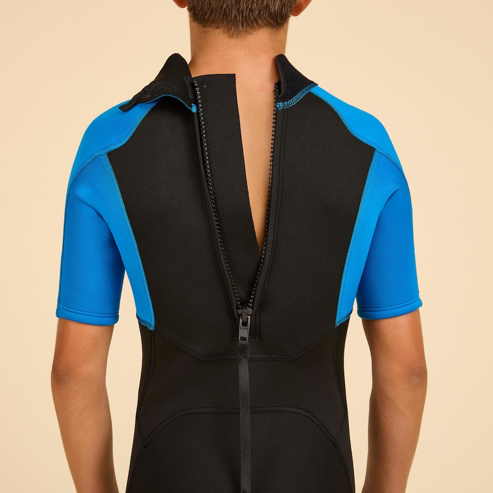 image 1 of Decathlon BOY’S SURFING 1.5 MM NEOPRENE SHORTY WETSUIT 500 BLUE BLACK