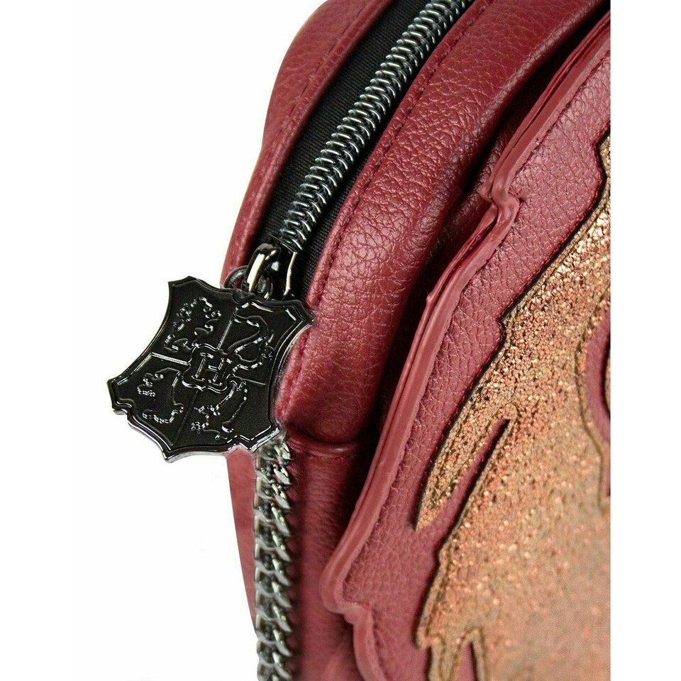 image 1 of Danielle Nicole Gryffindor Harry Potter Crossbody Bag - Pink - One Size | Pink