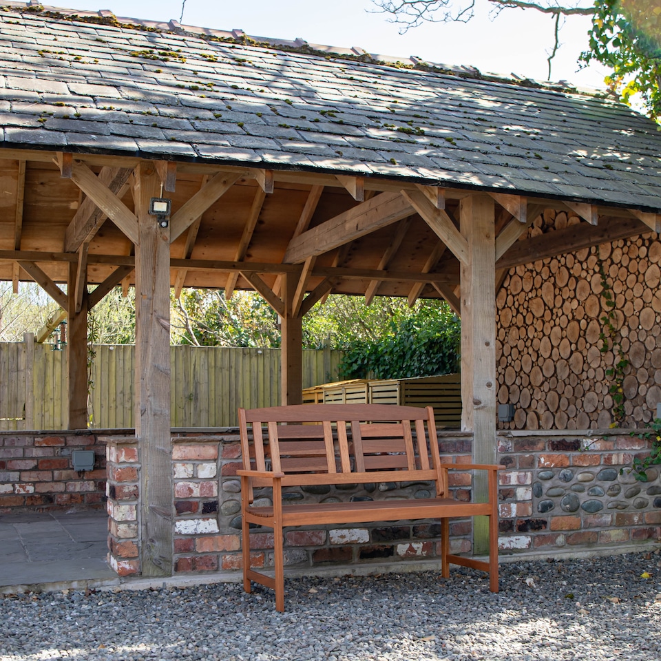 image 1 of Hawkshead 2 Seater Outdoor Wooden Garden Patio Bench | Brown | Brown