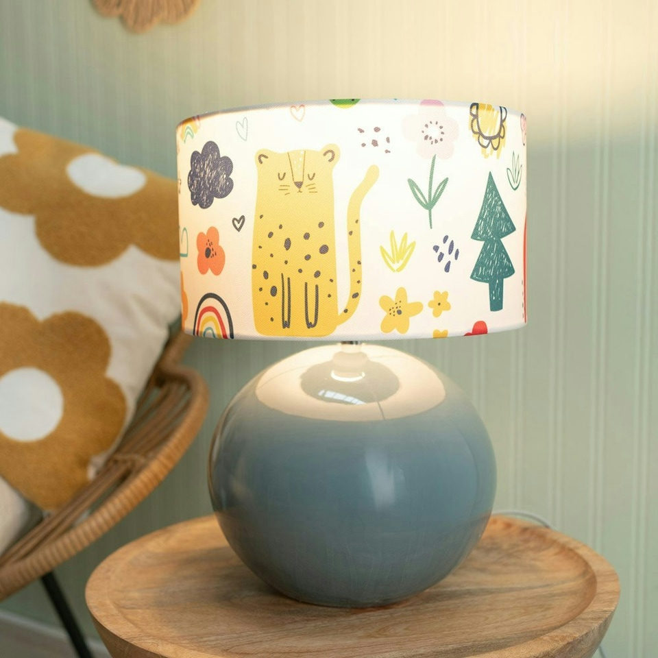 image 1 of ValueLights Bosco Eucalyptus Teal Globe Ceramic Table Lamp with Cartoon Doodle Lamp Shade and LED Bulb