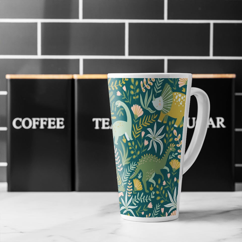 image 1 of Hand drawn dinosaurs and tropical leaves and flowers. Designer Latte Mug