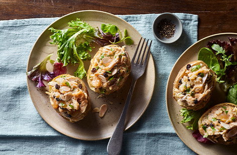 Image of "Coronation chicken stuffed potatoes"