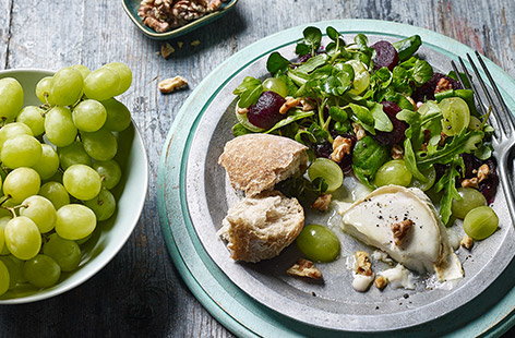 Image of "Baked goat's cheese with grape, walnut and beetroot salad"
