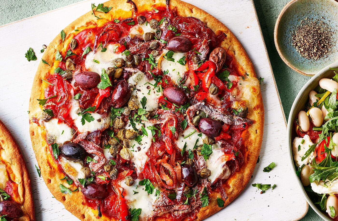 Red pepper and anchovy pizzas