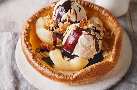 Image of "Yorkshire 'pudding' with pears and chocolate sauce"
