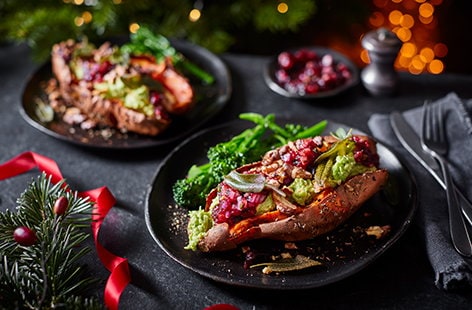Image of "Chilli and sage baked sweet potatoes with cranberry relish"