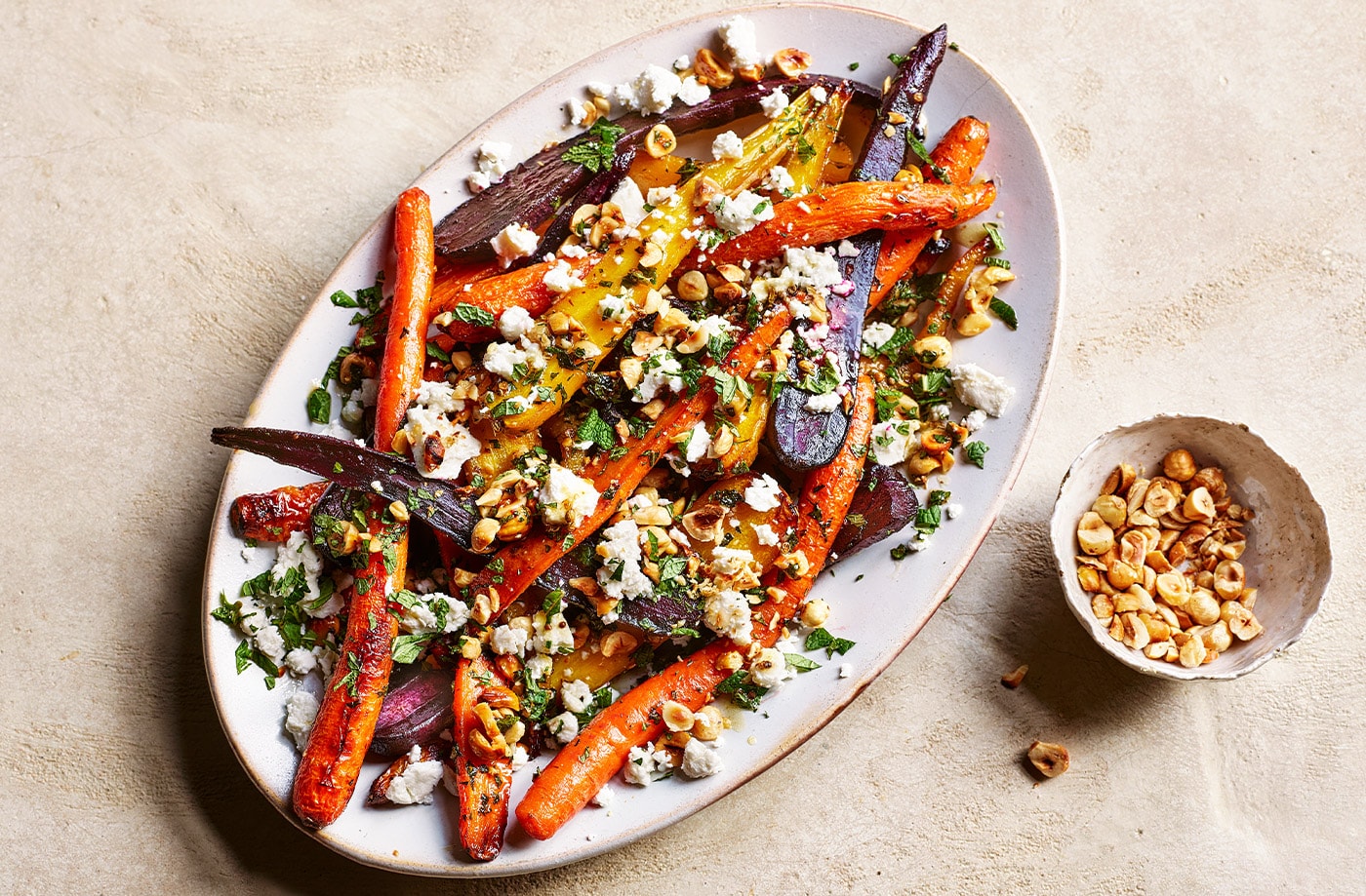 Rainbow carrots with feta and hazelnut