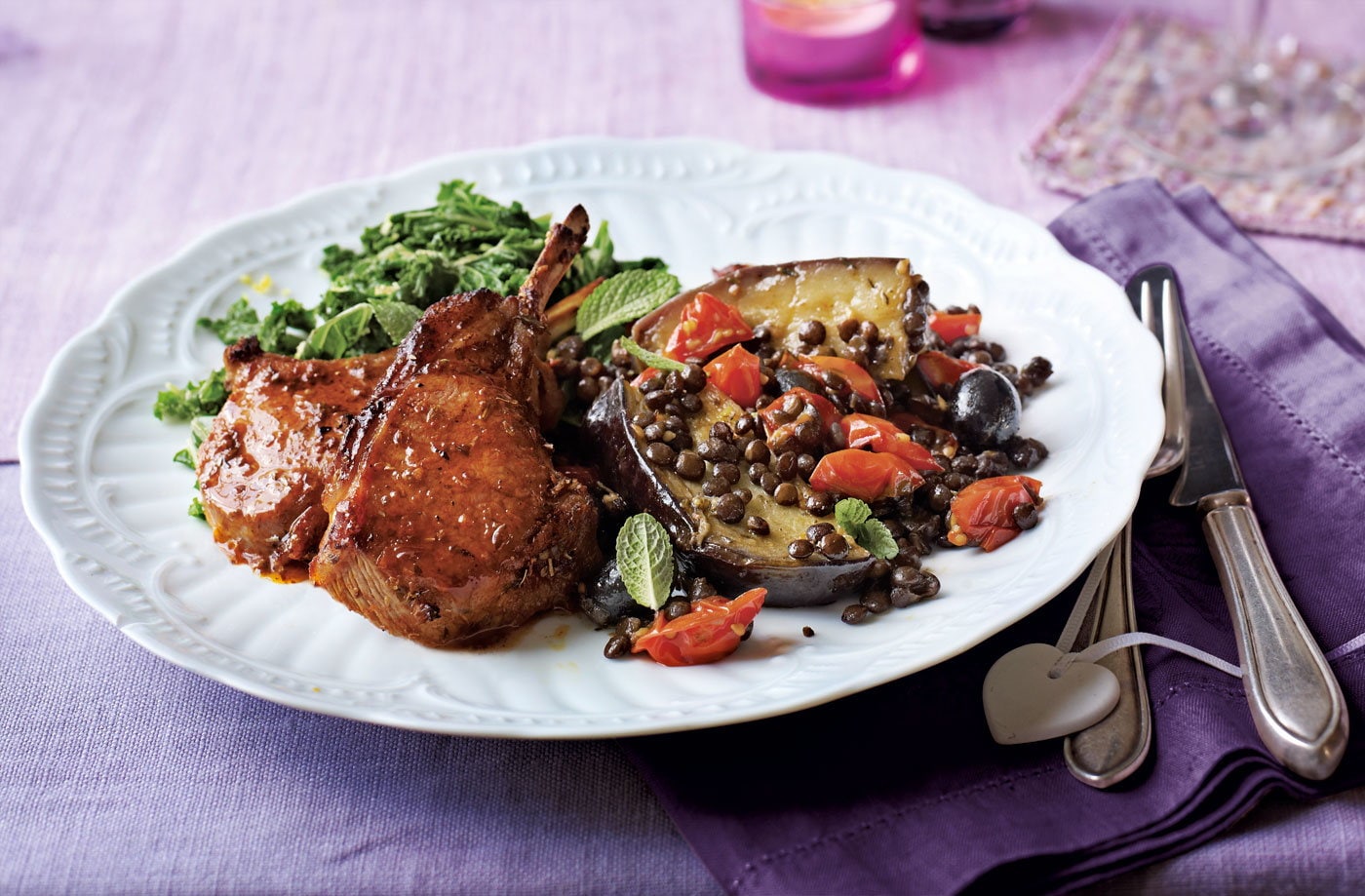 Paprika lamb cutlets with roasted aubergine, tomato, lentils and kale