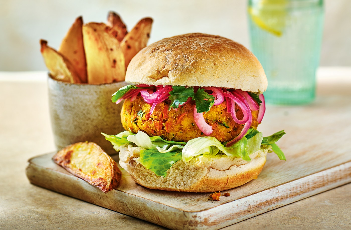 Spiced red lentil burgers with potato wedges