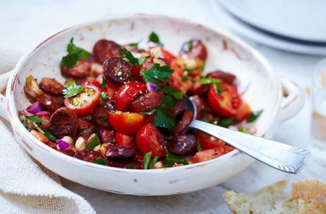 Image of "Tomato, red onion and chorizo salad"