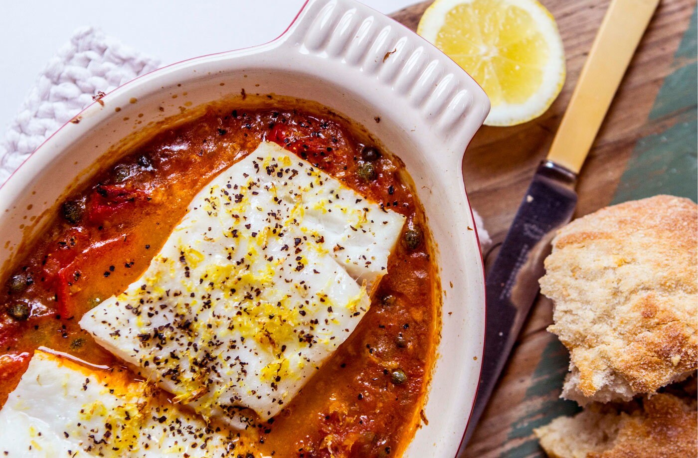 Baked cod with a rich tomato sauce