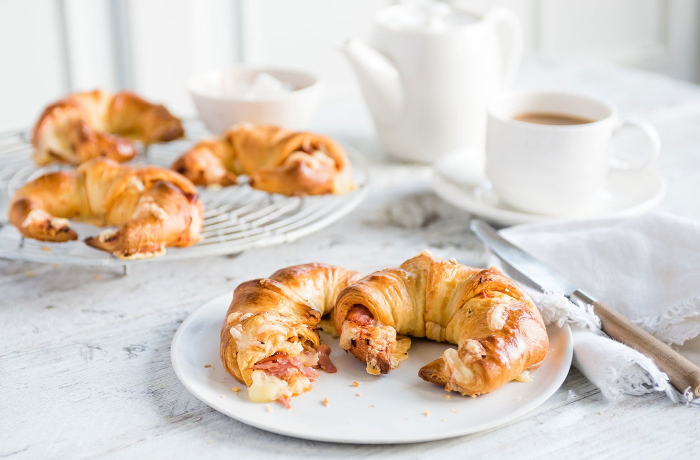 Cheese, sundried tomato and ham-stuffed croissants
