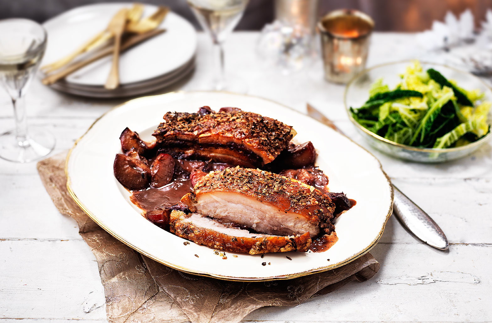 Roast pork belly with sloe gin plums
