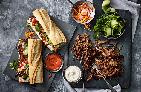Image of "Hoisin pulled pork with quick pickled vegetables"