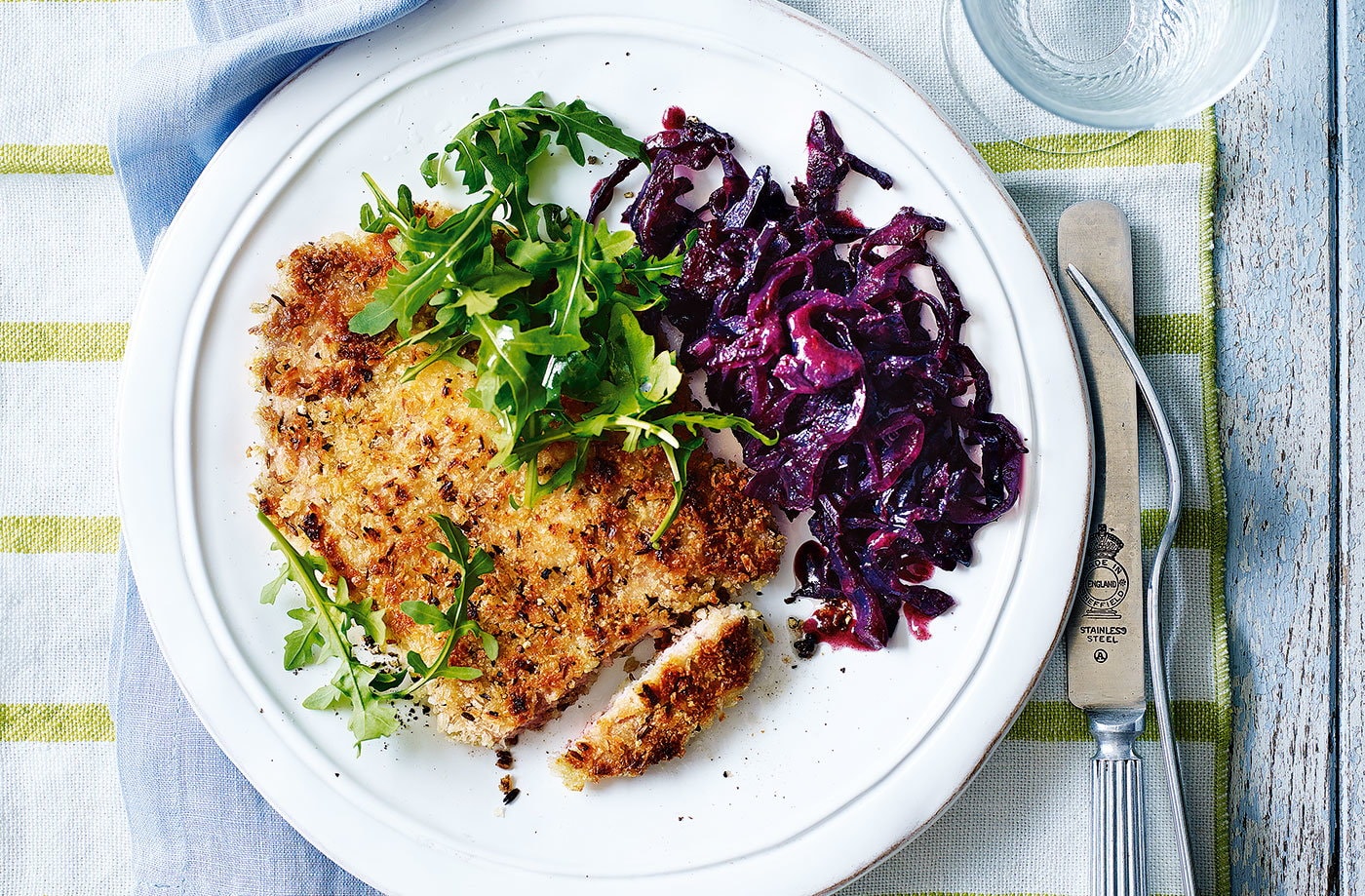 Crumbed pork chops with braised red cabbage