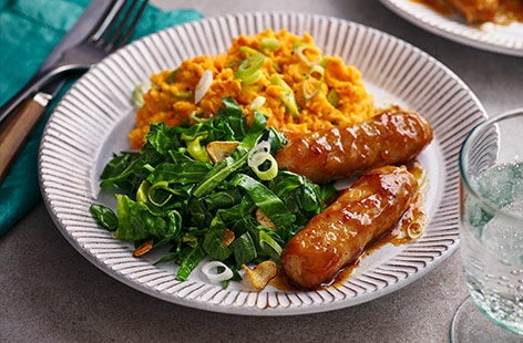 Image of "Teriyaki-glazed sausages with sweet potato mash"
