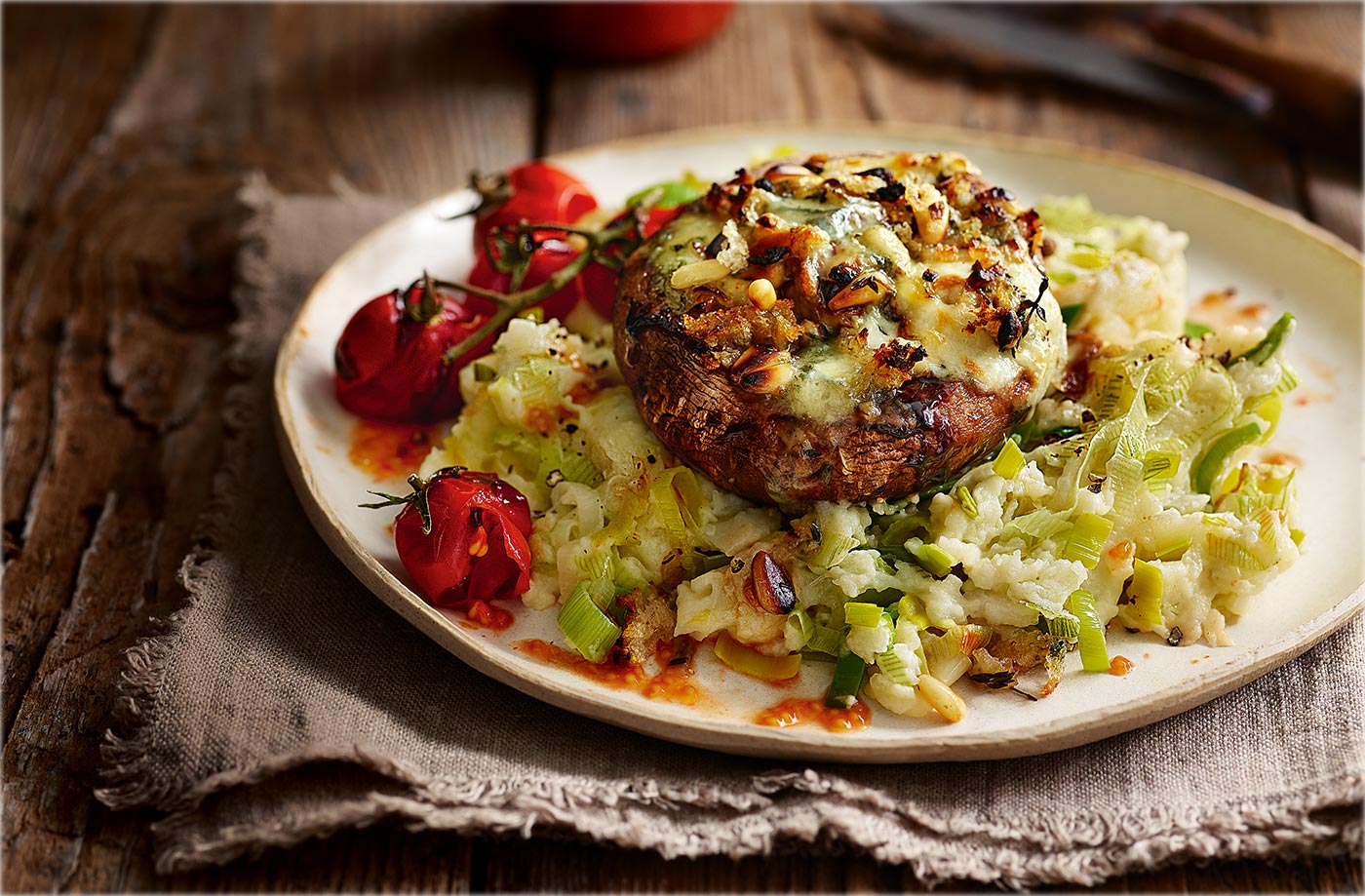 Cheesy stuffed mushrooms with leek mash