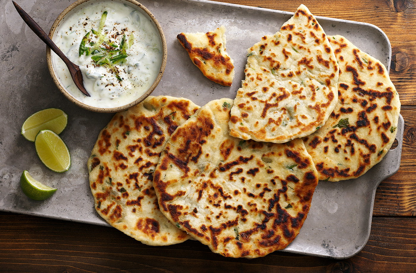 Garlic and coriander flatbreads with raita