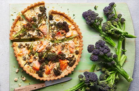 Image of "Purple sprouting broccoli, salmon and hazelnut tart"
