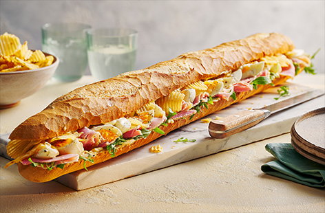Image of "Giant sharing ham, egg and crisps baguette"