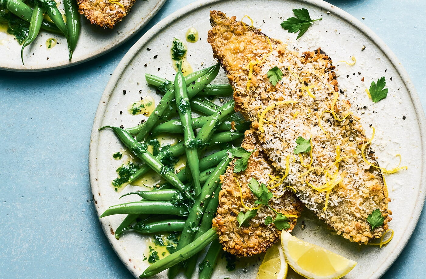 Aubergine schnitzel with garlicky green beans