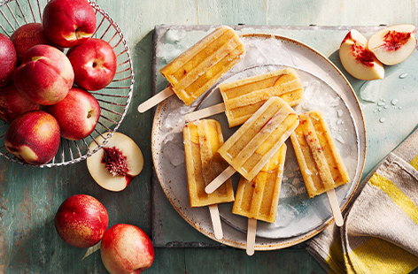 Image of "Nectarine, mint and honey ice lollies"