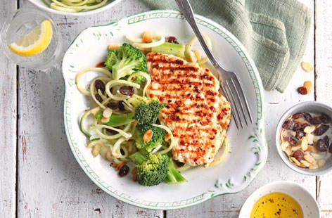 Image of "Griddled chicken with almond courgetti"