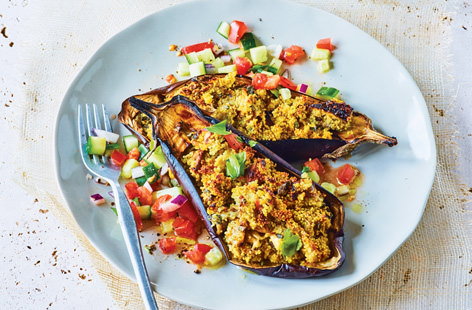 Image of "Stuffed aubergines with cucumber and tomato salad "