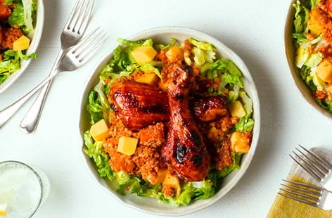 Image of "Sticky chicken drumsticks with mango couscous"
