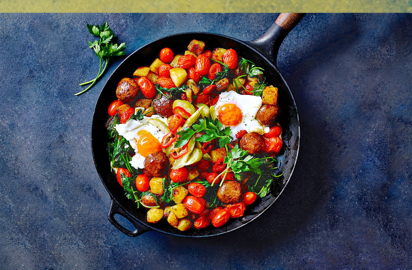 Meatballs with smoky potato and spinach hash