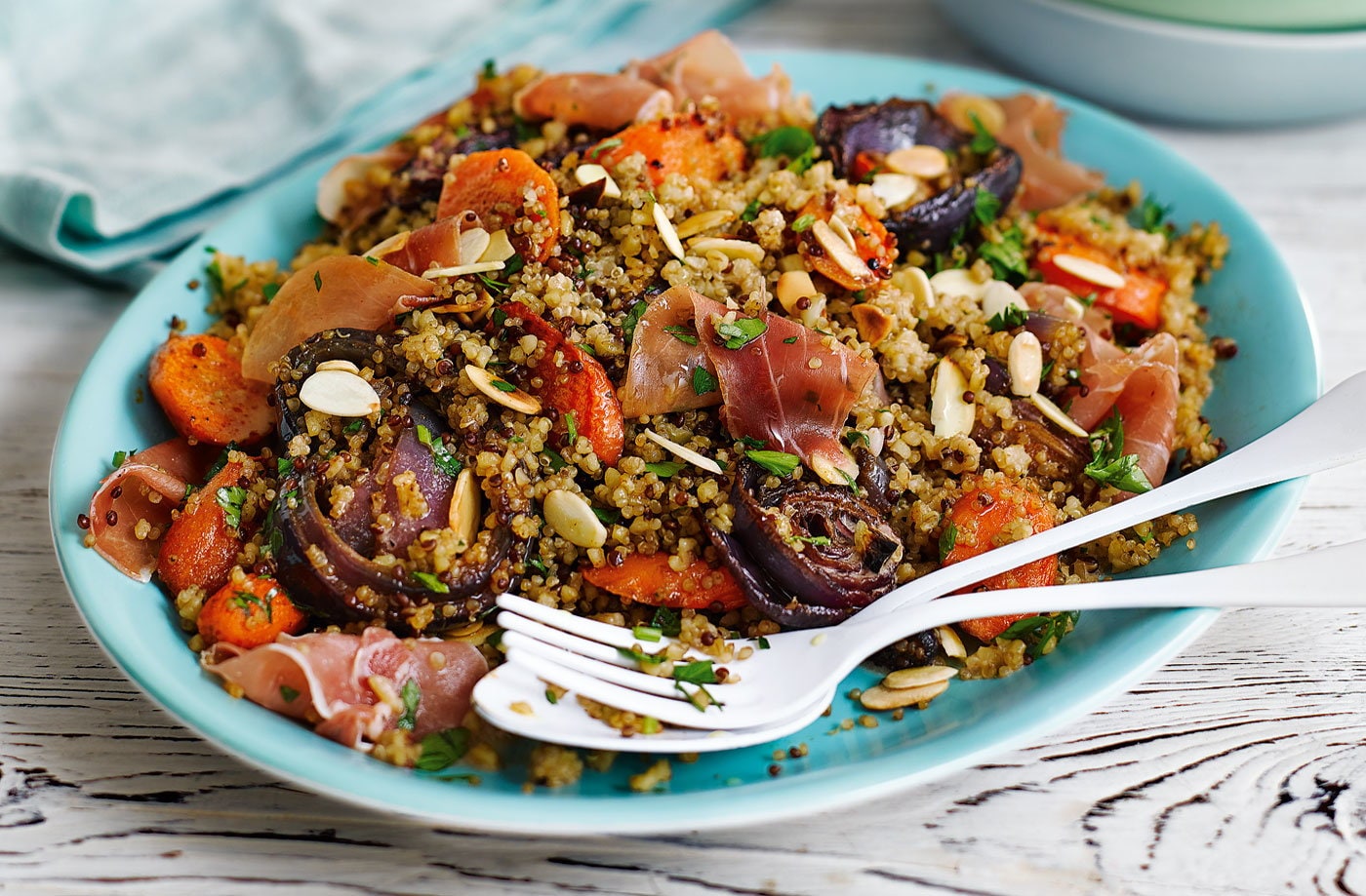 Roasted carrot quinoa with almonds and cured ham