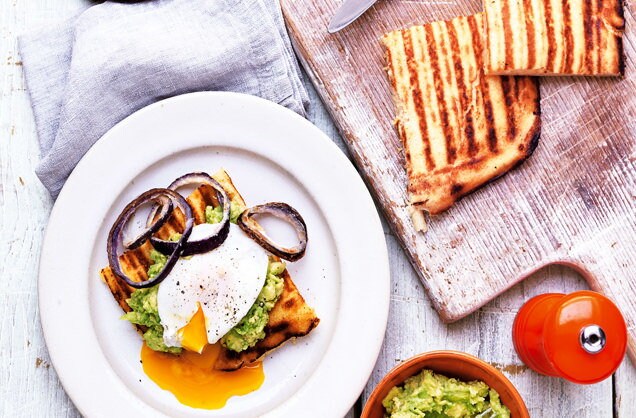 Waffle with avocado and poached eggs