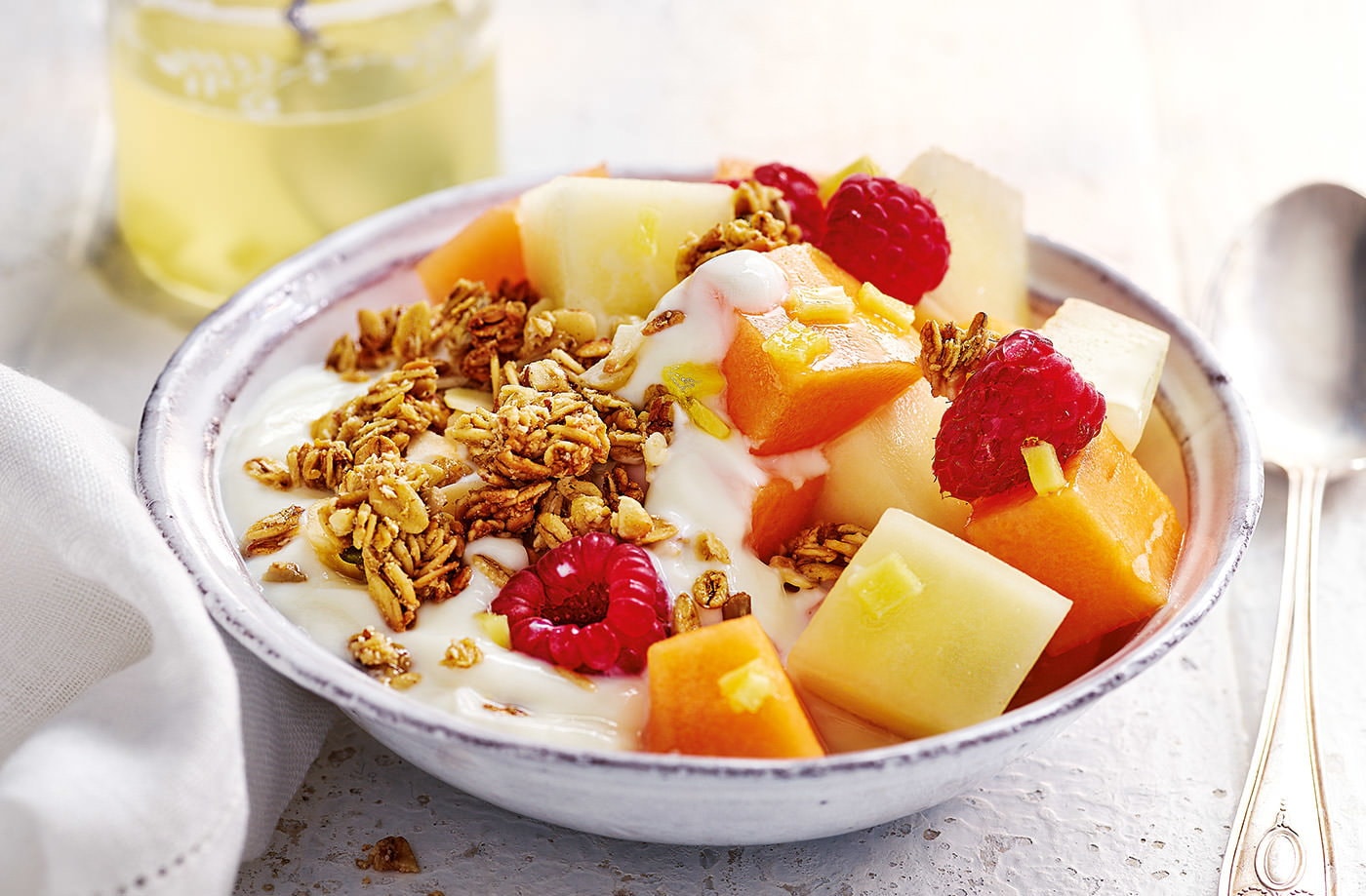 Ginger-lemon melon and raspberry breakfast bowl