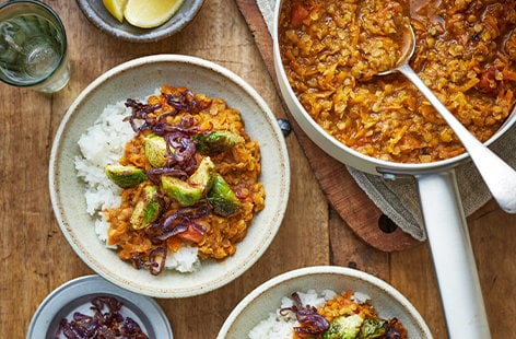 Image of "Red lentil and carrot dhal with spiced sprouts"
