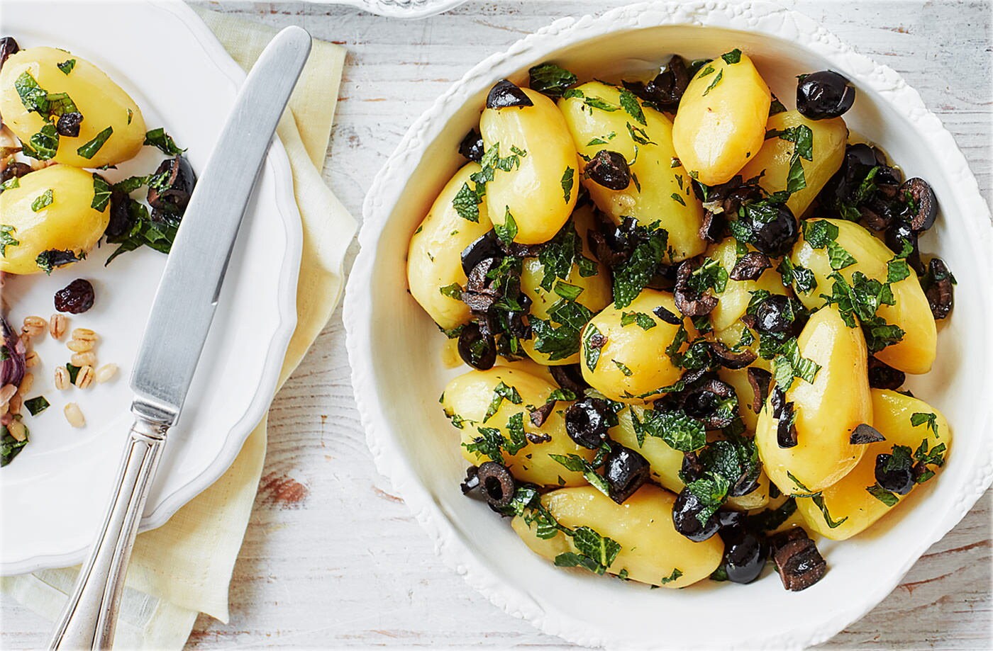 New potatoes with mint oil and black olives