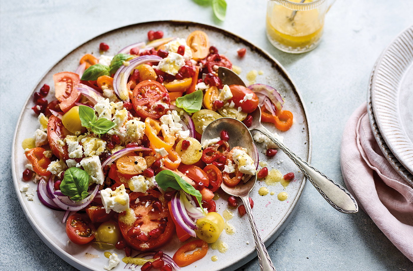 Tomato, onion, pepper and pomegranate salad