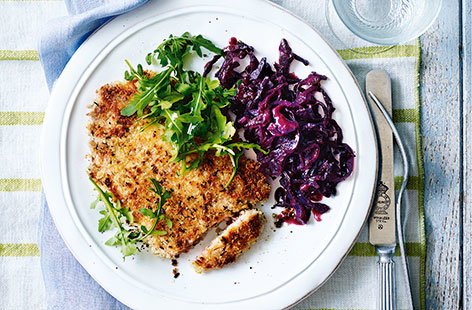 Image of "Crumbed pork chops with braised red cabbage"