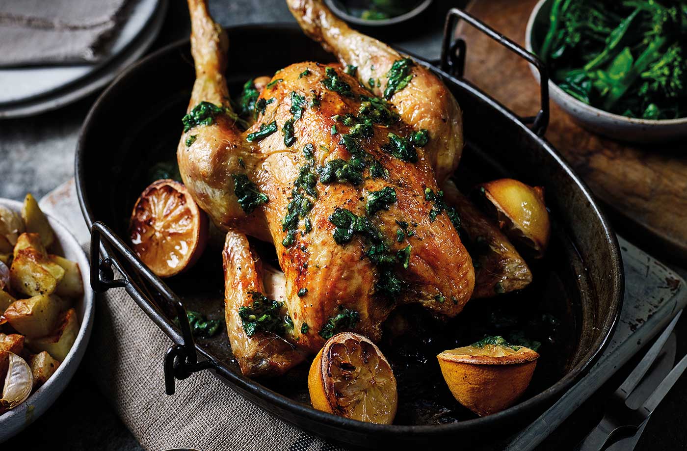 Roast chicken with basil and lemon salsa and garlic potatoes