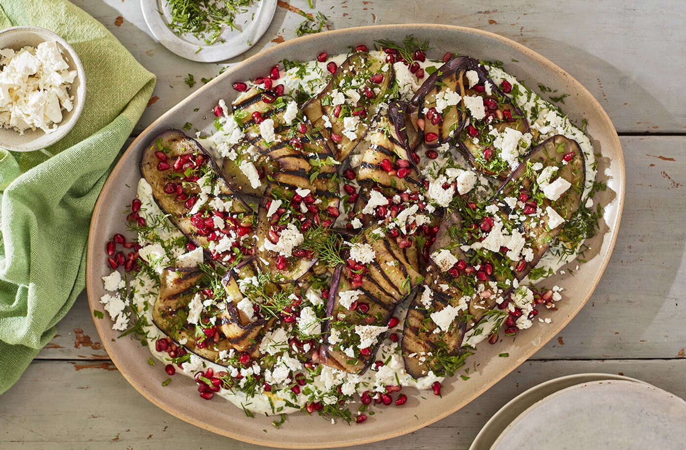Baba ganoush aubergines with tahini yogurt and pomegranate