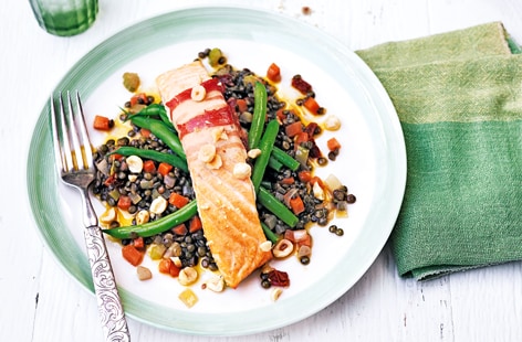 Image of "Roasted pancetta-wrapped salmon with lentils"