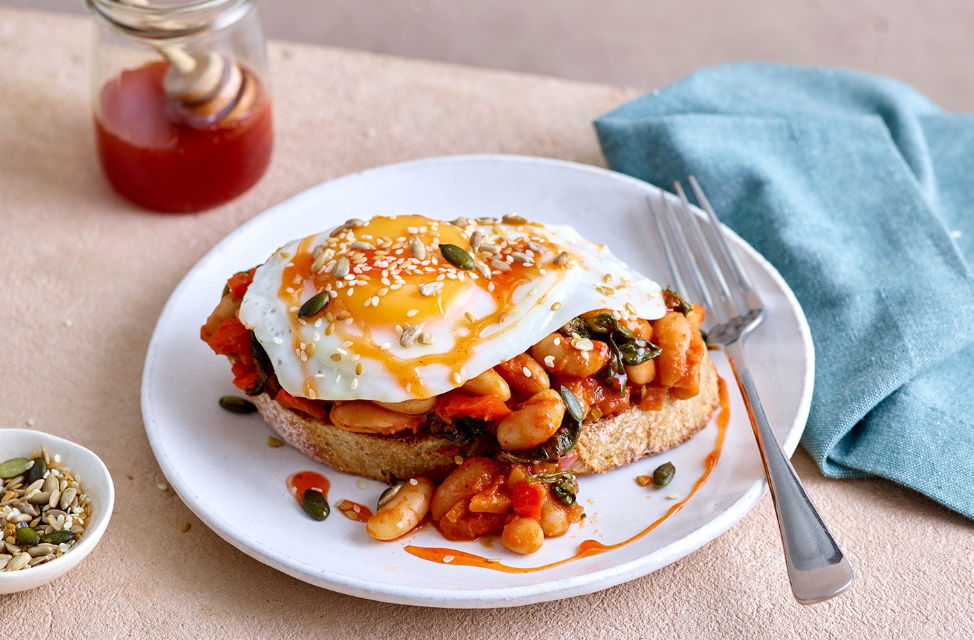 Hearty baked cannellini beans with sriracha hot honey