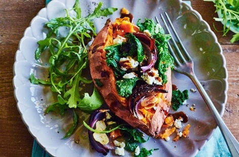 Image of "Baked sweet potatoes with kale, feta, chilli and onion"