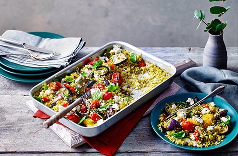 Image of "Roast vegetable and pesto bulgur wheat traybake"