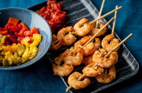Image of "Alfred Prasad's prawn skewers with tomato chutney and roast peppers"